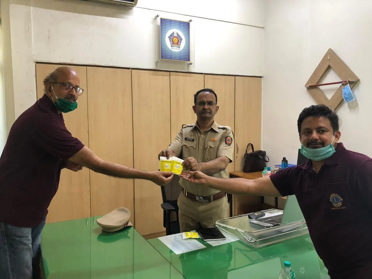 Police officers receiving immunity kits