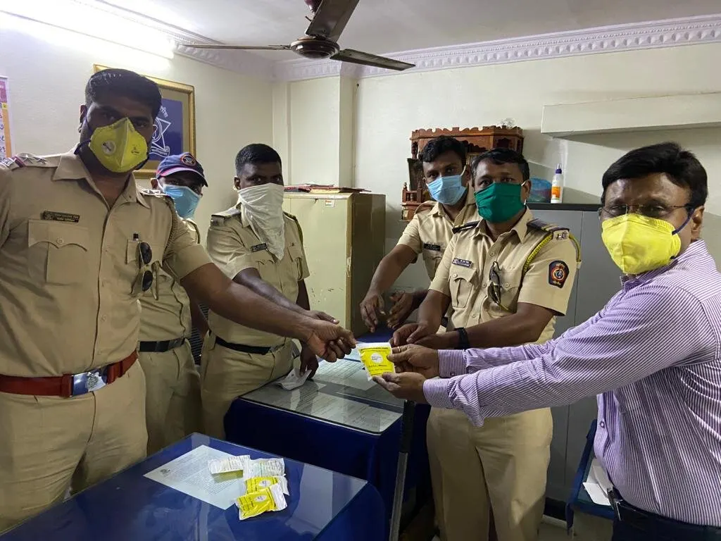 Police officers receiving immunity kits