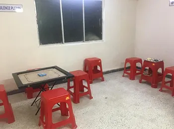 Carrom boards and seating at the Recreation Kendra