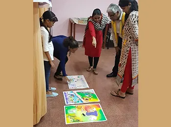 Judges reviewing children's artwork